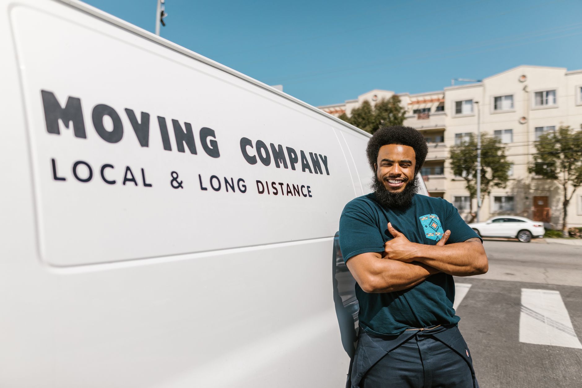 Professional movers in Ngong load furniture into a moving truck for affordable relocation services.